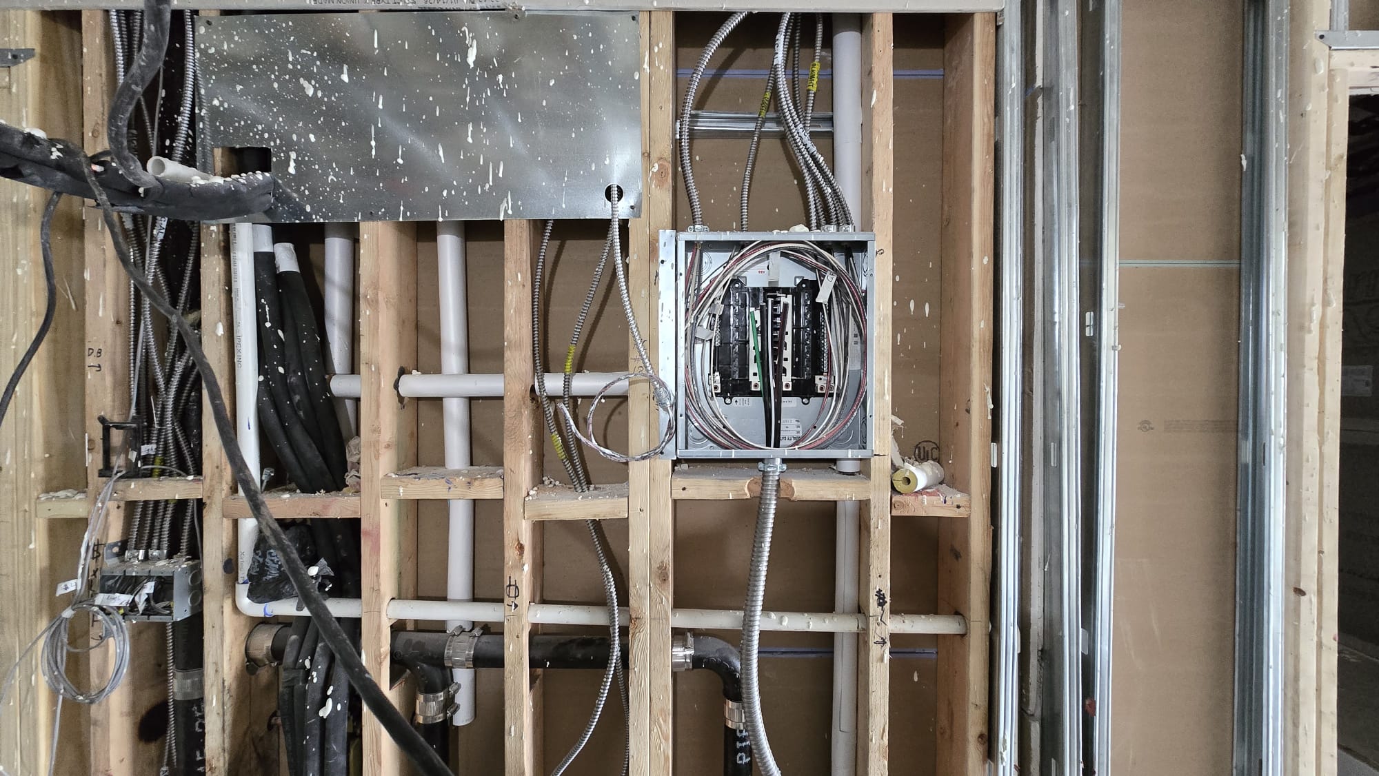 Electrical Panel & Plumbing Rough-In — Wood Framing